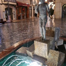Fountain with boy and fish in the center of Cartagena